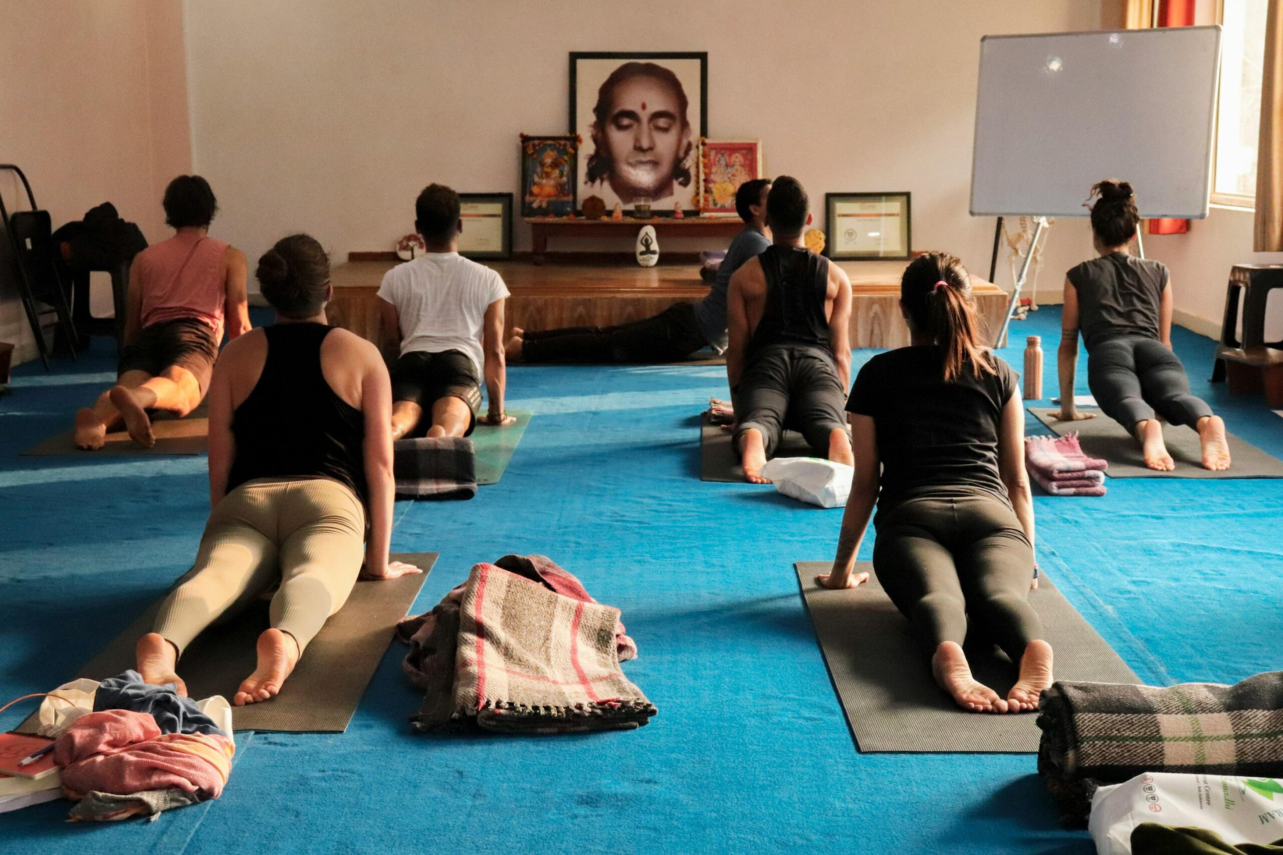 students learning basics of yoga
