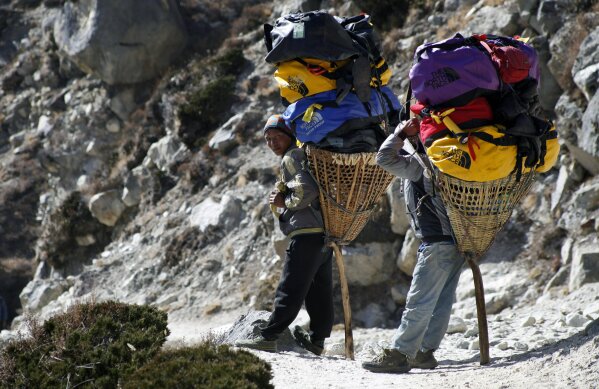 guides and porters in nepal trekking take you to safety